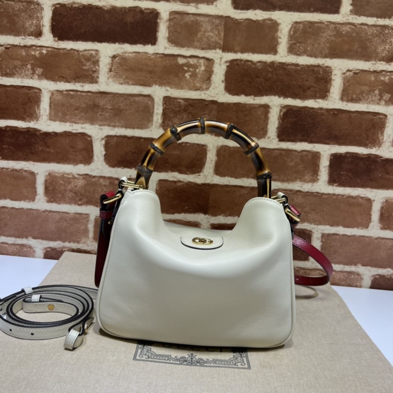 G*u*i top handle bags